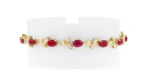 7.00 ct. t.w. Ruby and .56 ct. t.w. Diamond Bracelet in 14kt Yellow Gold