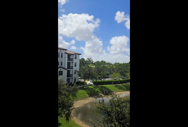 Beautiful lakeside view in the heart of Doral Main Photo