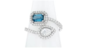 .50 Carat London Blue Topaz and .73 ct. t.w. Lab-Grown Diamond Bypass Ring in Sterling Silver