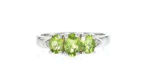 1.10 ct. t.w. Peridot Three-Stone Ring with Diamonds in Sterling Silver