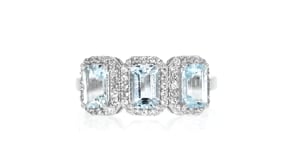 1.30 ct. t.w. Aquamarine Three-Stone Ring with .10 ct. t.w. White Topaz in Sterling Silver