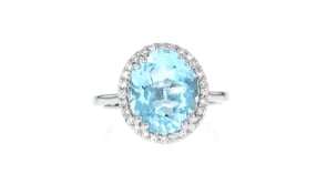 5.50 Carat Sky Blue Topaz Ring with .24 ct. t.w. Lab-Grown Diamonds in Sterling Silver