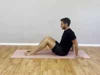Estiramineto gluteo sentado