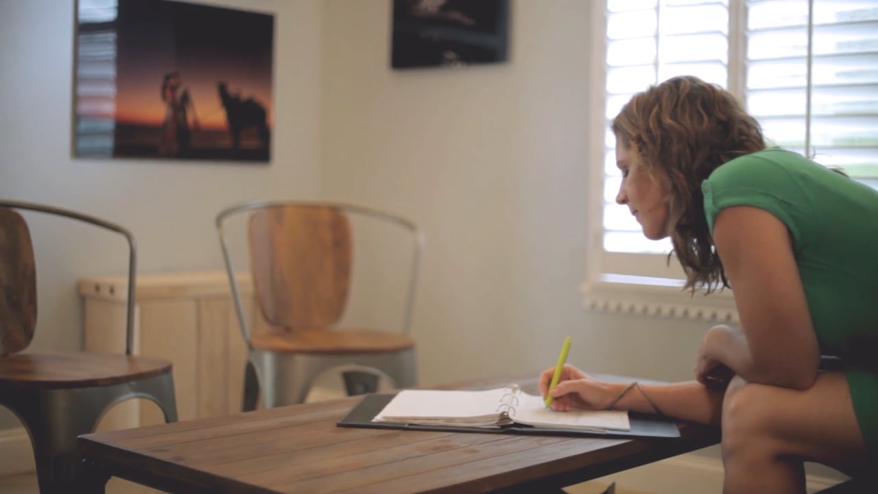 Still from our studio workflow film, putting a wedding album together
