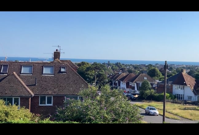 Video 1: There is unrestricted parking in the road, plus a triple driveway.