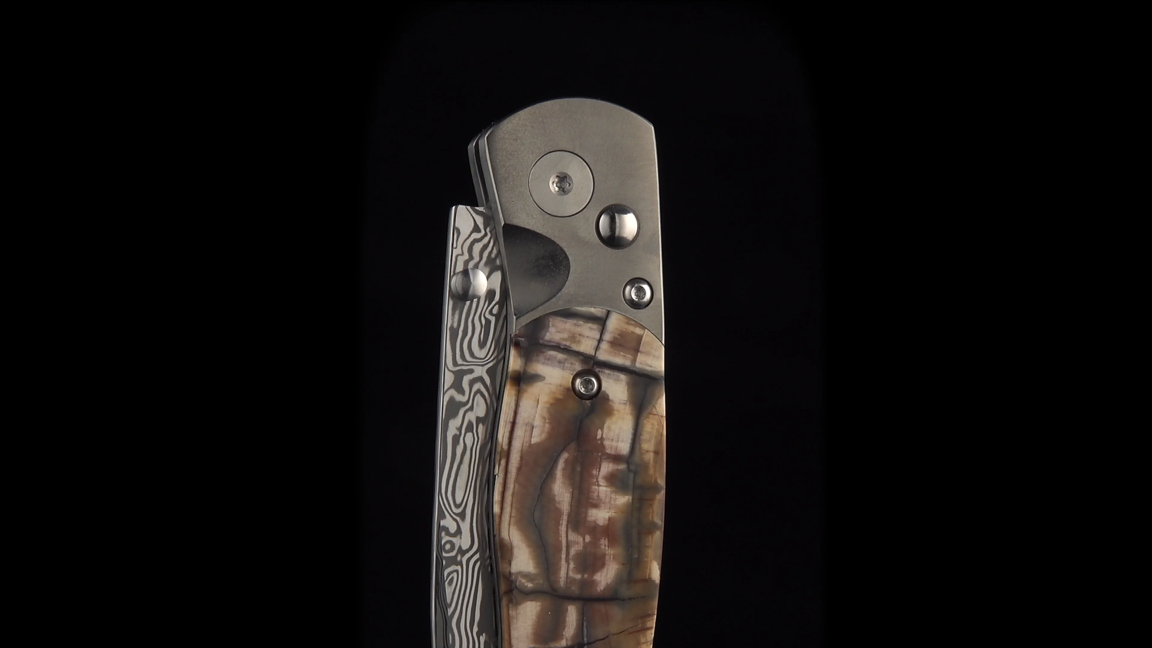 El Rey –Titanium Button Lock with Damasteel with Carmel Fossilized