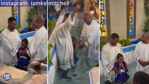 Kel Baptizes His Daughter
