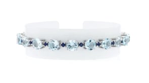 20.00 ct. t.w. Sky Blue Topaz and 1.70 ct. t.w. Sapphire Tennis Bracelet in Sterling Silver