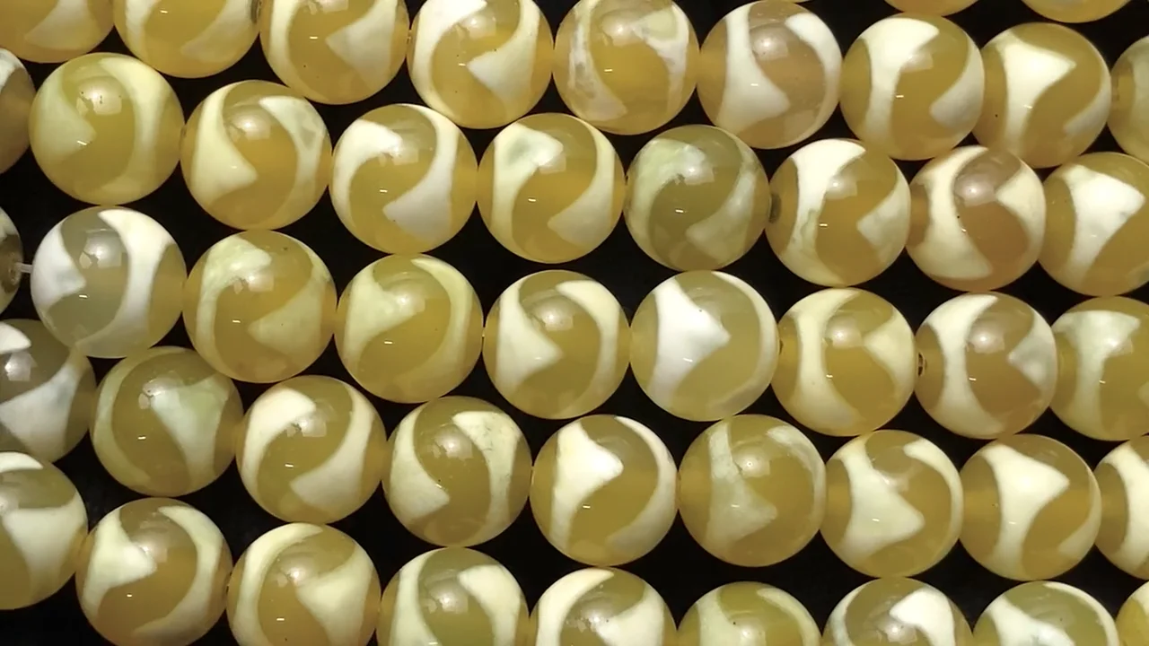 虎牙天珠（こがてんじゅ） ラウンド10mm イエロー 半連/1連｜天然石