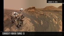 Freeze-frame from video showing the Curiosity rover on Mars. 