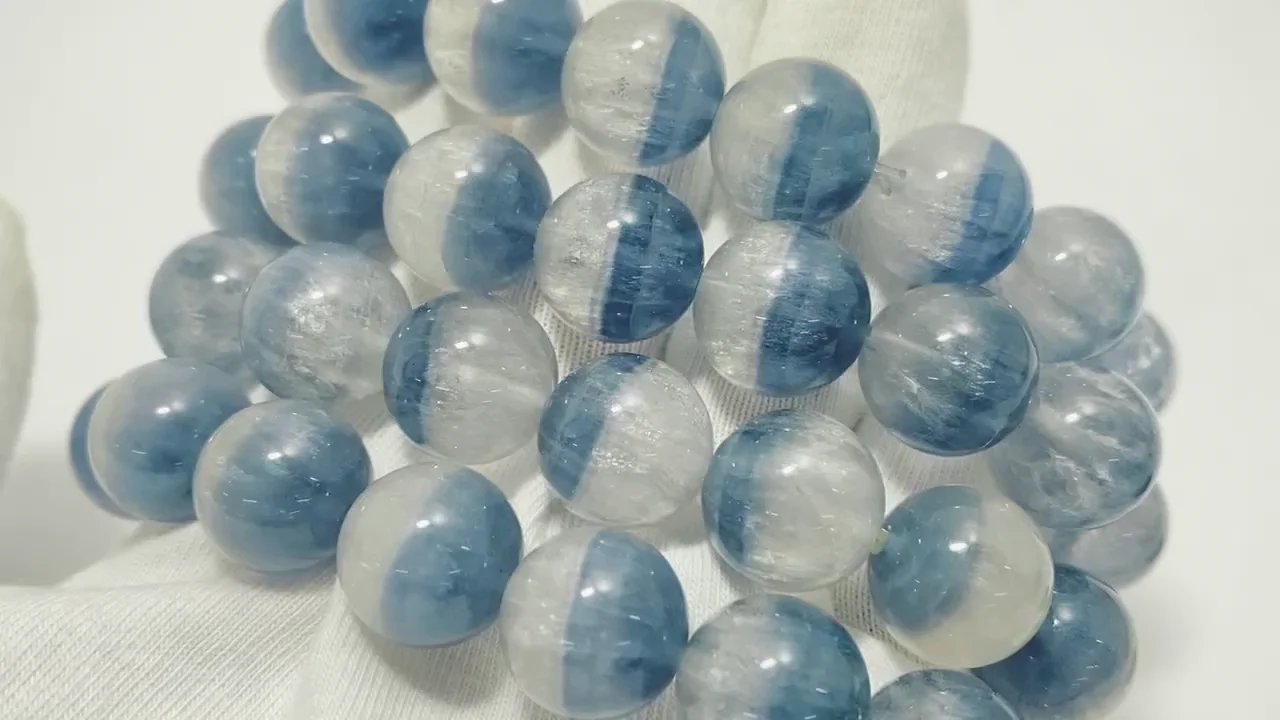 動画】バイカラーフローライトAAA ラウンド13mm 1連(ブレス) - 天然石