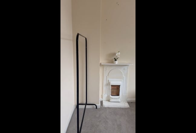 Newly carpeted and furnished room Main Photo