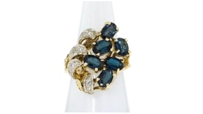 C. 1970 Vintage 3.30 ct. t.w. Sapphire Cluster Ring with .12 ct. t.w. Diamonds in 14kt Yellow Gold