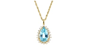 C. 1980 Vintage 7.50 Carat Sky Blue Topaz Pendant Necklace with .60 ct. t.w. Diamonds in 14kt Yellow Gold