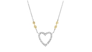 C. 1990 Vintage .85 ct. t.w. Diamond Heart Necklace in 18kt Two-Tone Gold