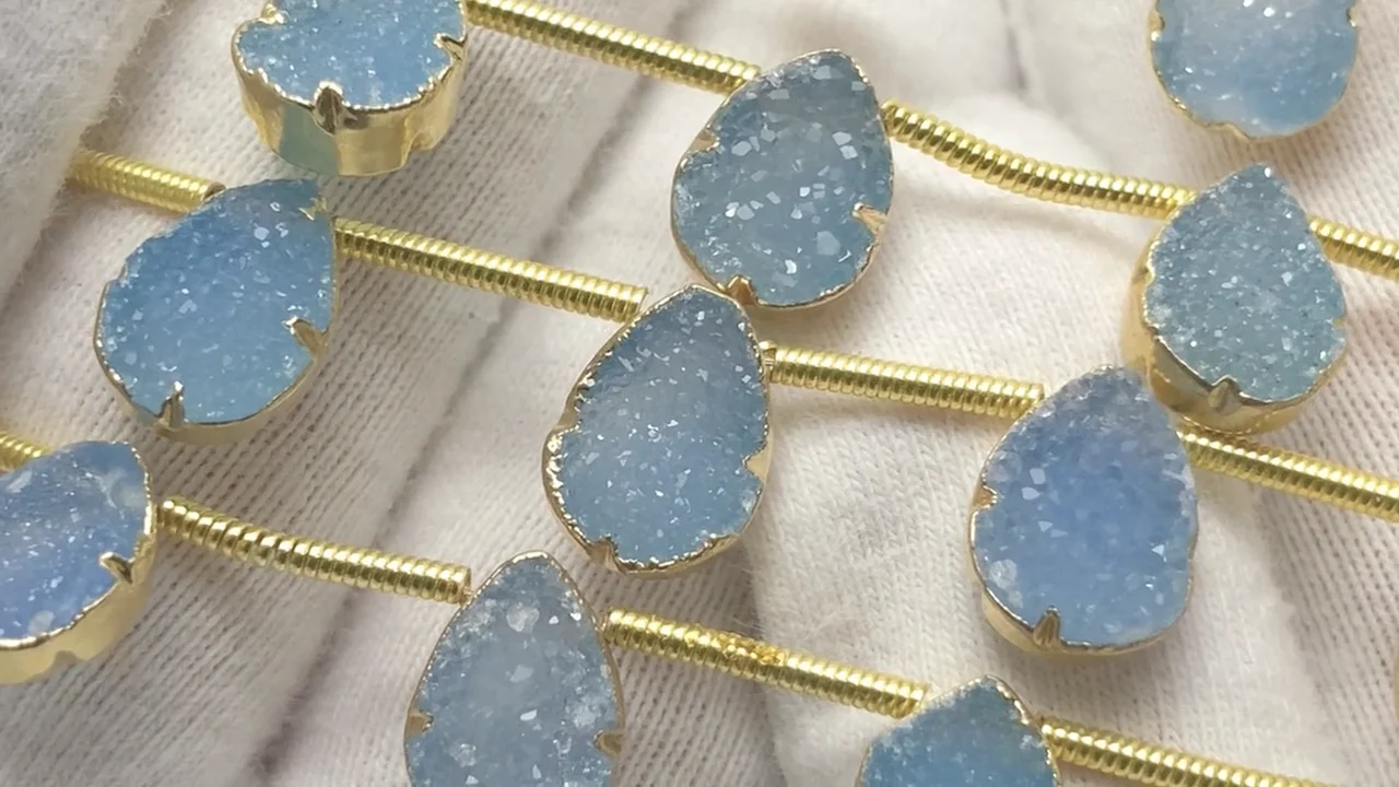 ドゥルージーアゲート 枠留めペアシェイプ ブルー 半連/1連｜天然石