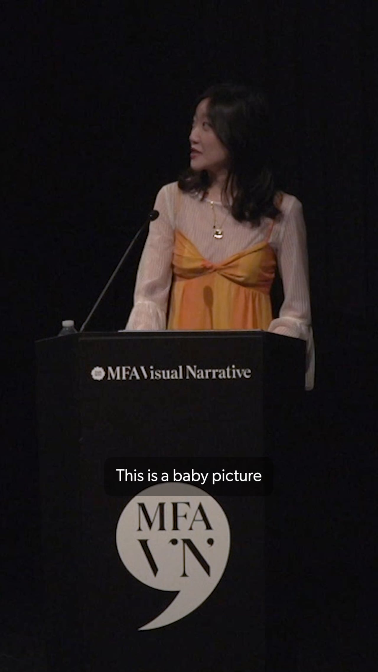 MFA Visual Narrative Student Haelee Lim stands at the podium presenting her Artist Presentation