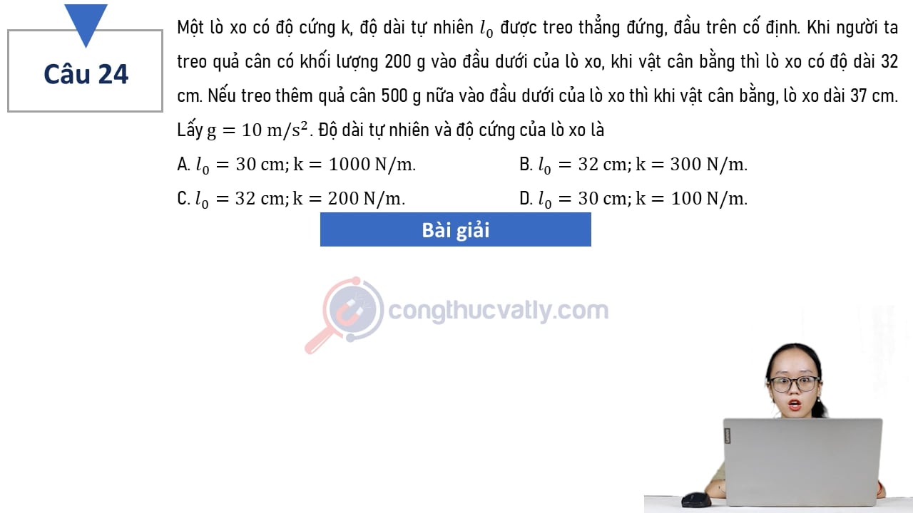 Nếu treo thêm quả cân 500 g nữa vào đầu dưới của lò xo thì khi vật cân bằng, lò xo dài 37 cm. Lấy g = 10 m/s^2. Độ dài tự nhiên và độ cứng của lò xo là