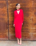 Vidéo: Robe midi avec dos ouvert et manches chauve-souris