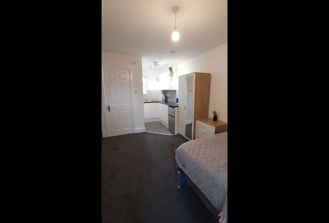 Video 1: Kitchenette with plenty of cupboards and worktop space