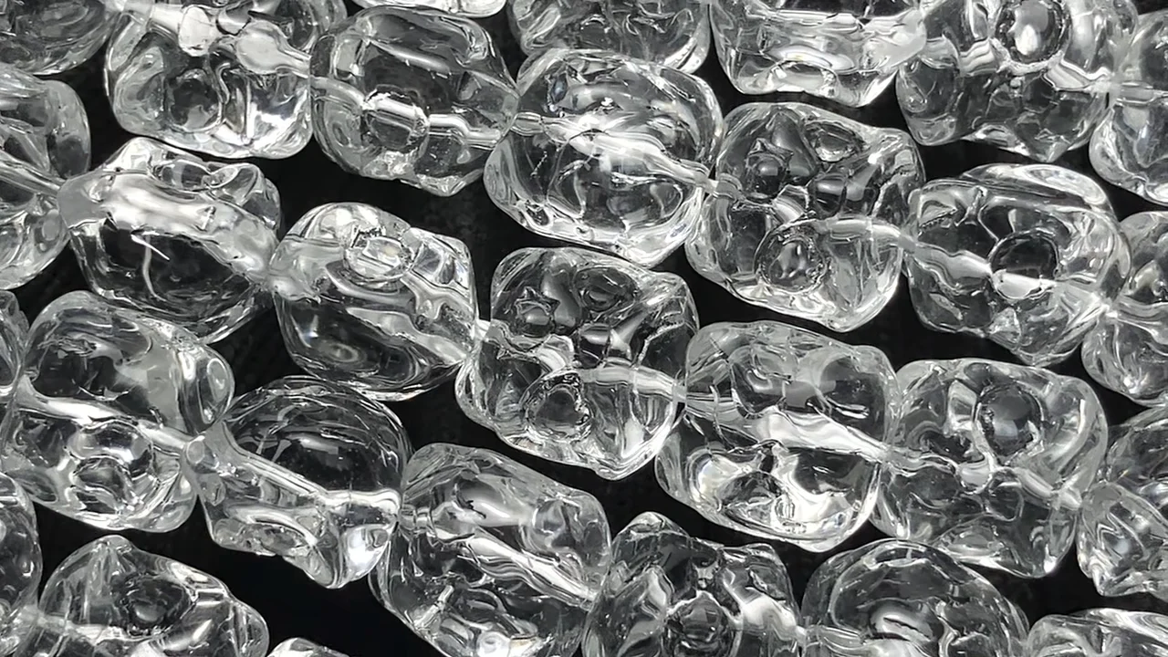 クリスタル（溶錬水晶） 獅子頭12×11.5mm 1連｜天然石ビーズの卸問屋