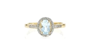 .90 Carat Sky Blue Topaz Ring with .10 ct. t.w. Diamonds in 10kt Yellow Gold