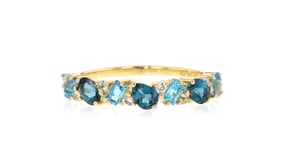 .90 ct. t.w. White and Tonal Blue Topaz Ring in 10kt Yellow Gold