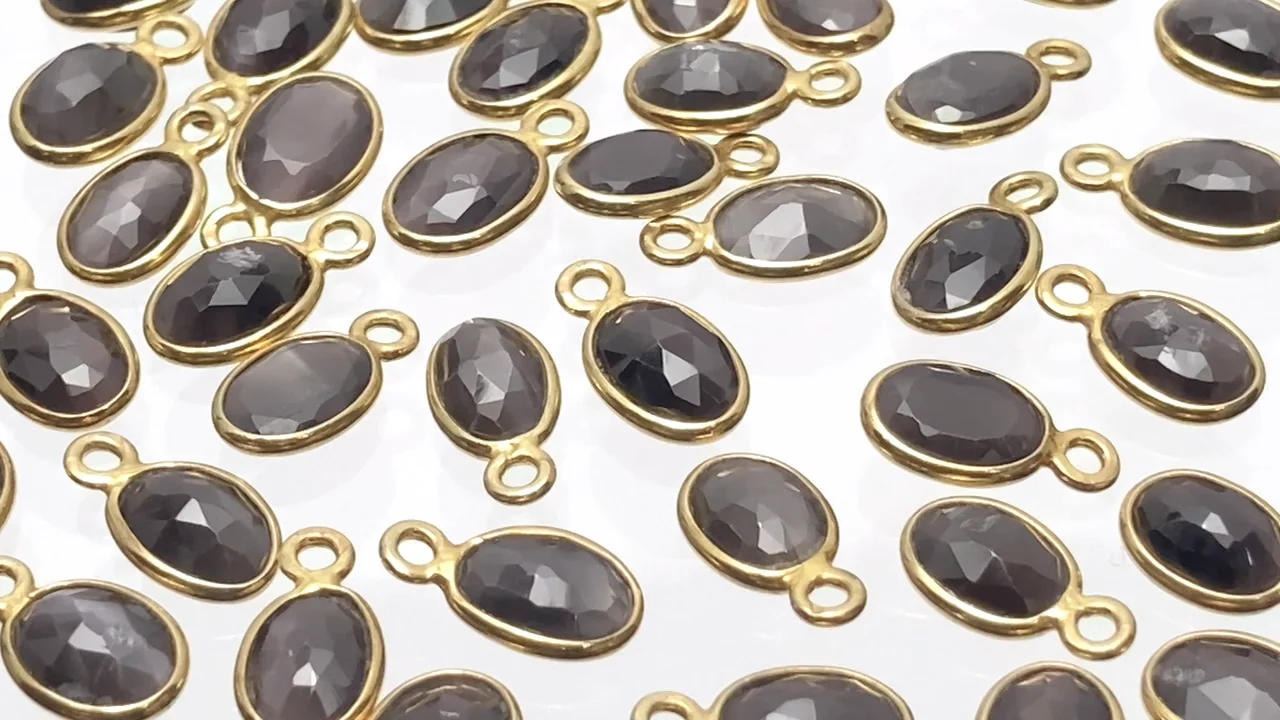 シリマナイト・キャッツアイ 枠留めローズカット8×6mm 【片カン