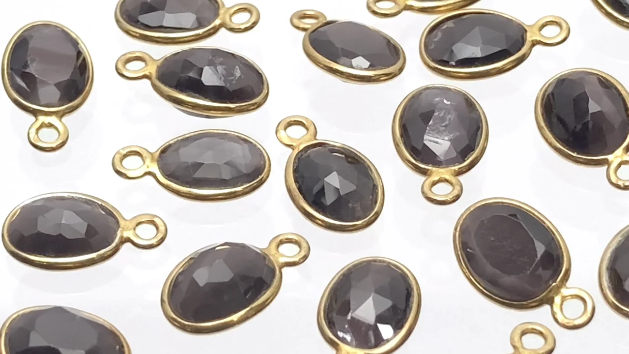 シリマナイト・キャッツアイ 枠留めローズカット9×7mm 【片カン