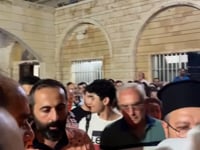 وقفة تضامنية في مدينة طرطوس بعد التفجير الذي استهدف كنيسة مار الياس في حي الدويلعة