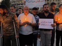 وقفة تضامنية في منطقة محطة بغداد في مدينة حلب مع ذوي ضحايا تفجير كنيسة مار الياس