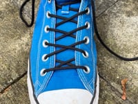 Cyrus Highsmith Demonstrates How to Tie a Shoe