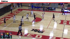 Illegal Screen called as offensive player bumps defender out of the way at the free throw line.