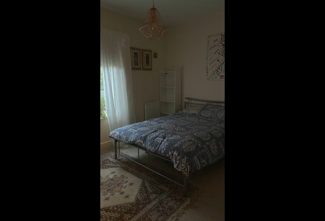A delightful double room in a peaceful  home  Main Photo