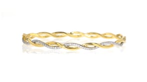 .15 ct. t.w. Diamond Twisted Bangle Bracelet in 18kt Gold Over Sterling