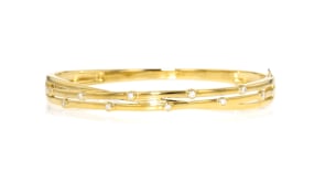 .15 ct. t.w. Bezel-Set Diamond Crisscross Bangle Bracelet in 18kt Gold Over Sterling