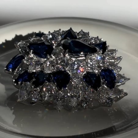 BROOCH OF RDS AND PS