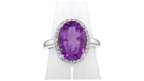 5.50 Carat Oval Amethyst Ring with .40 ct. t.w. White Topaz in Sterling Silver