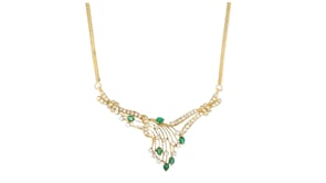 C. 1990 Vintage 1.85 ct. t.w. Diamond and .75 ct. t.w. Emerald Necklace in 18kt Yellow Gold