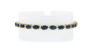 C. 1980 Vintage 14.40 ct. t.w. Sapphire and .50 ct. t.w. Diamond Bracelet in 18kt Yellow Gold