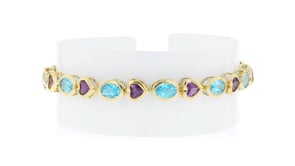 C. 2000 Vintage 14.60 ct. t.w. Bezel-Set Amethyst and Swiss Blue Topaz Heart Bracelet in 14kt Yellow Gold