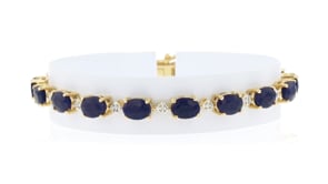 16.00 ct. t.w. Sapphire and .14 ct. t.w. Diamond Bracelet in 18kt Gold Over Sterling
