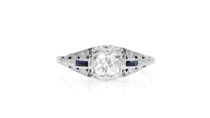 C. 1950 Vintage .41 Carat Diamond Ring with .10 ct. t.w. Synthetic Sapphires in 18kt White Gold