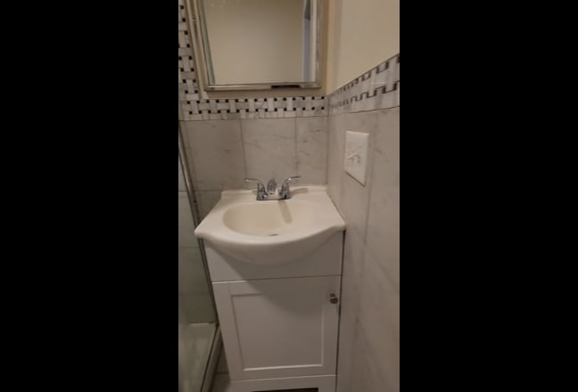 Bedroom with backyard view and private bath Main Photo