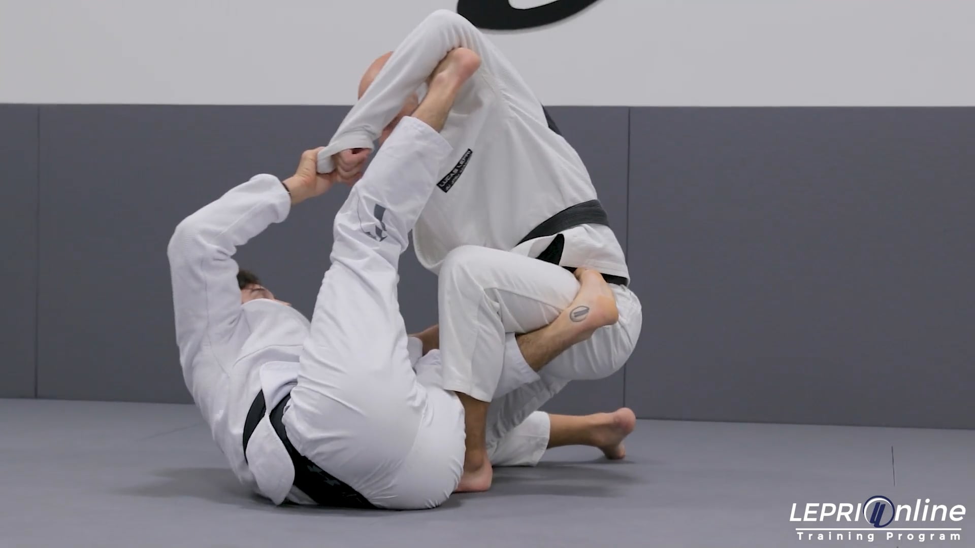 Lepri BJJ Online Training: Spider Guard with Revese De La Riva Sweep to Kne