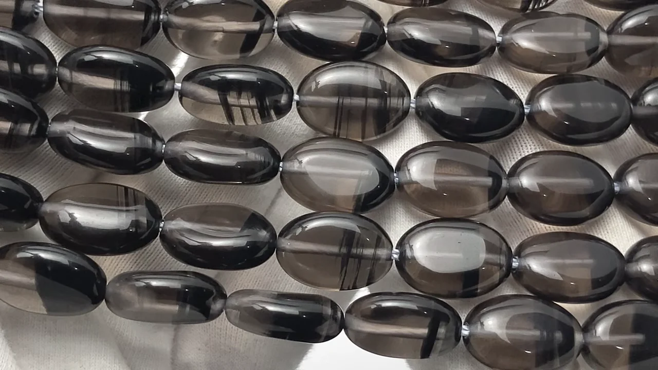 ミッドナイトレースオブシディアン オーバル14×10mm 半連/1連｜天然石