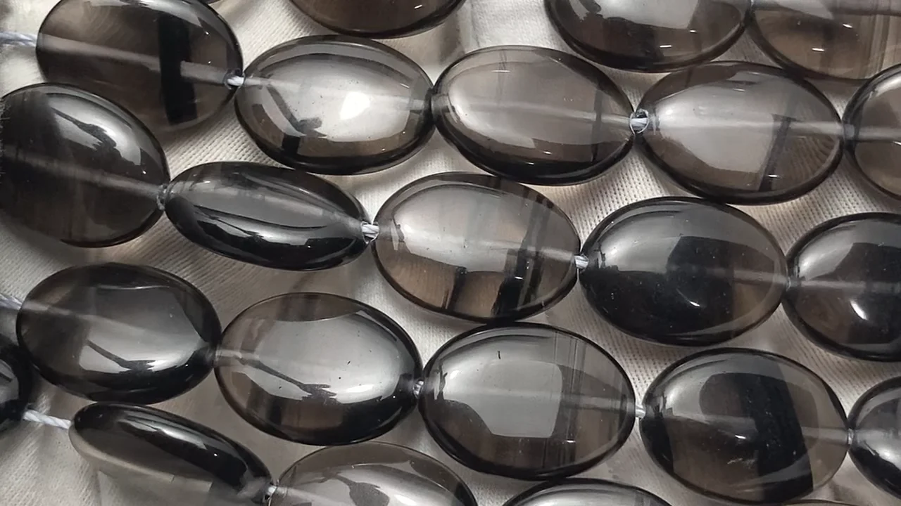 ミッドナイトレースオブシディアン オーバル18×13mm 半連/1連｜天然石