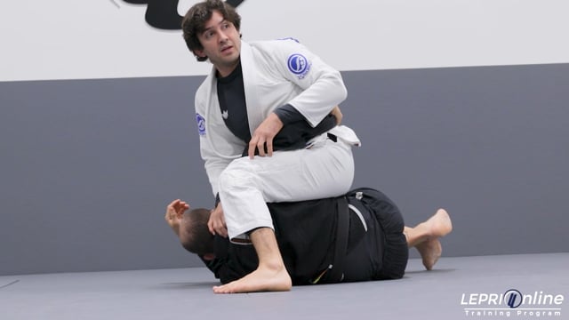 Quarter Mount Defense to Armbar from Top or Omoplata