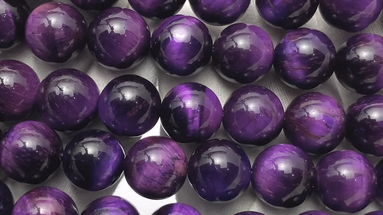 パープルカラータイガーアイ ラウンド12mm 半連/1連｜天然石ビーズの卸