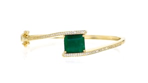 5.50 Carat Emerald Bypass Bangle Bracelet with .30 ct. t.w. White Topaz in 18kt Gold Over Sterling